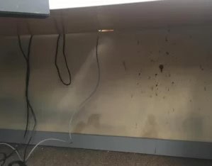 Before Deep Cleaning a Dirty Stained Cubicle Wall