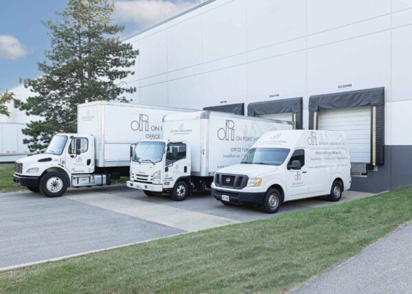 On Point Installations' Trucks at Warehouse Docks